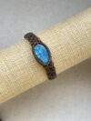 Blue flash labradorite with dark brown cord